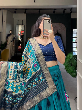 blended-tussar-silk-lehenga-set-with-patola-print-with-foil-work-blue-1