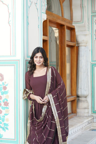 Analyzing image    faux-georgette-gown-dupatta-suit-set-with-parallel-sequins-embroidered-work-color-brown-1