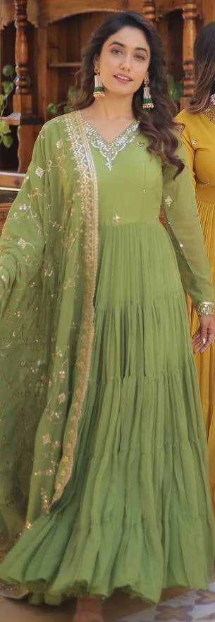 Analyzing image    heavy-silk-gown-dupatta-suit-with-sequence-embroidery-work-color-green