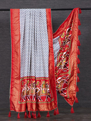 Orange Colour Dola Silk Dupatta, Laheriya - Patola Print and Foil Work also comes with Tassels