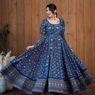 A Beautiful Blue Patola  Print Gown With full Sleeve Border