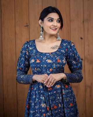 A Beautiful Blue Patola  Print Gown With full Sleeve Border