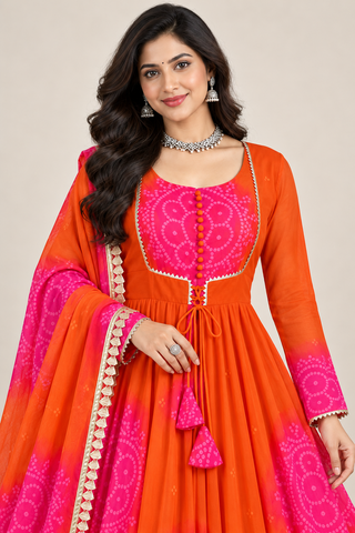 Orange and pink Anarkali set on model, bodice close-up