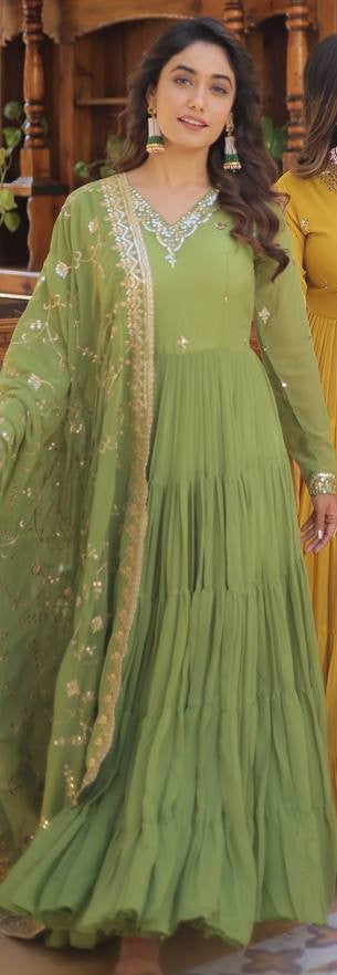  Analyzing image    heavy-silk-gown-dupatta-suit-with-sequence-embroidery-work-color-green