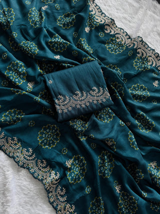 mulmul-chinnon-saree-with-print-heavy-embroidery-work-silk-blouse-color-blue-1