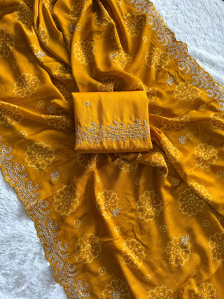 mulmul-chinnon-saree-with-print-heavy-embroidery-work-silk-blouse-color-yellow-1