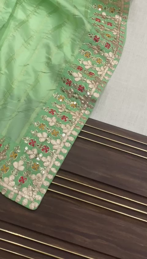 banarasi-silk-saree-zari-weaving-embroidery-sequins-work-color-green