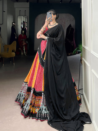 pure-rayon-lehenga-choli-dupatta-batwa-set-with-bandhej-ajarakh-paper-mirror-gamthi-work-lace-touch-up-color-red-yellow-3