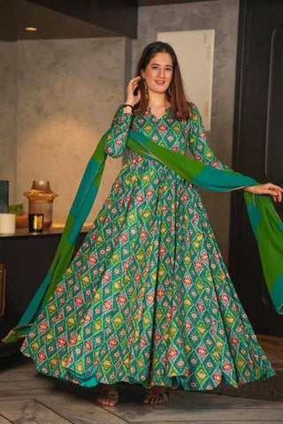 rayon-muslin-gown-pant-dupatta-suit-set-with-floral-print-work-color-green