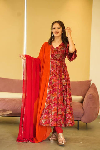 rayon-muslin-gown-pant-dupatta-suit-set-with-floral-print-work-color-red