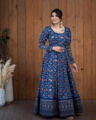 A Beautiful Blue Patola  Print Gown With full Sleeve Border