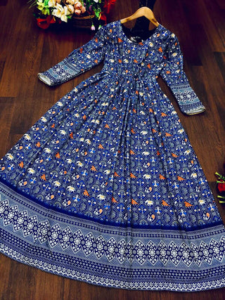 A Beautiful Blue Patola  Print Gown With full Sleeve Border